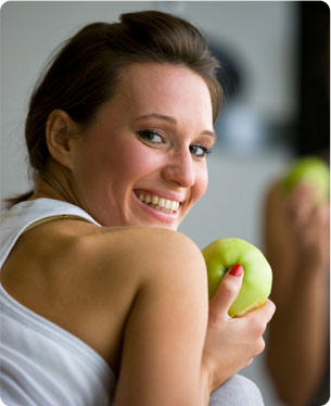 photo-SmilingWomanApple.jpg